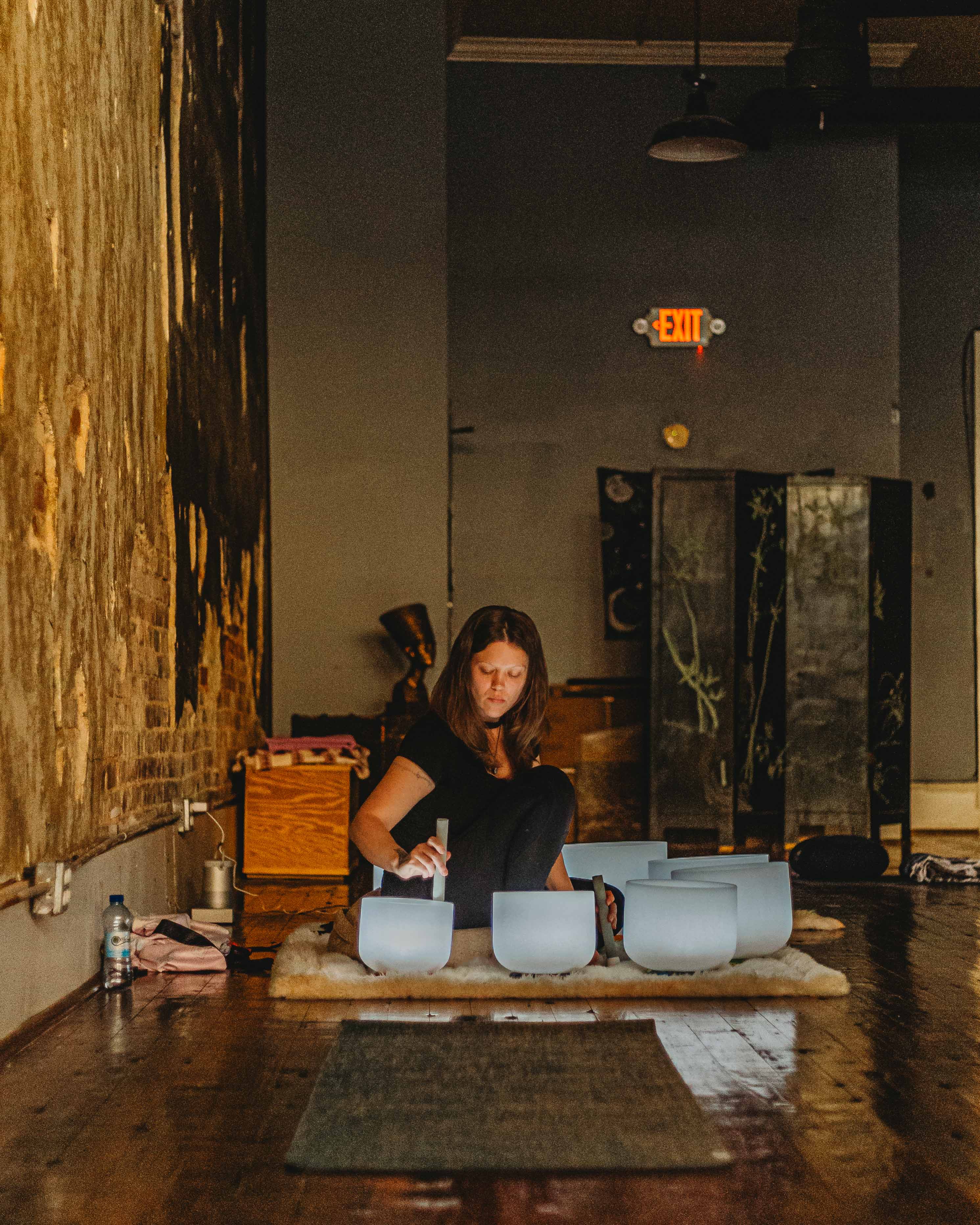 Stormy facilitating a group sound bath
